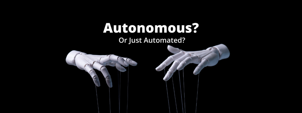 Two robotic hands suspended against a black background with puppet strings hanging from their fingers beneath the headline “Autonomous? Or Just Automated?”, symbolizing AI agent security and human-controlled automation.